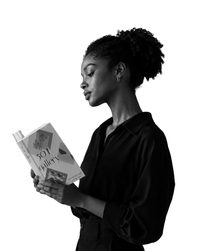 An author reading a copy of 501 Galleries