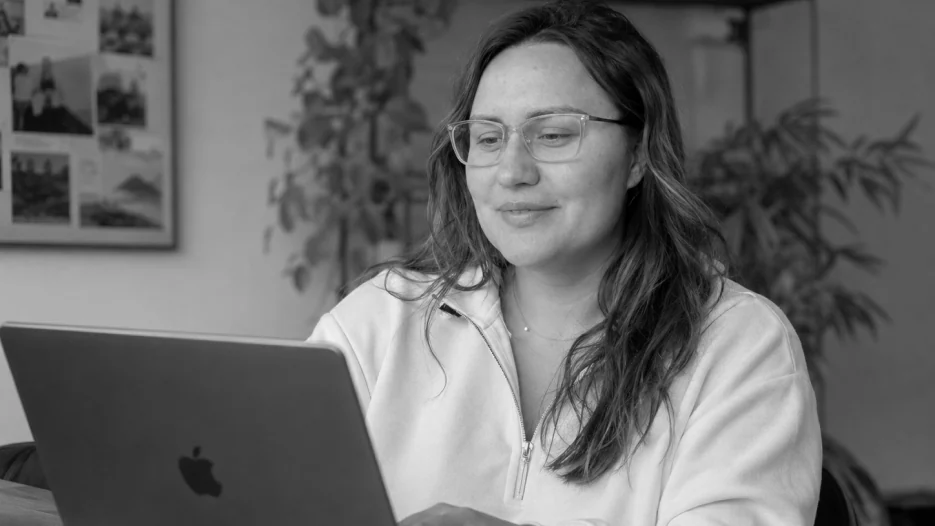 Marina at her laptop during a Discovery Sprint call
